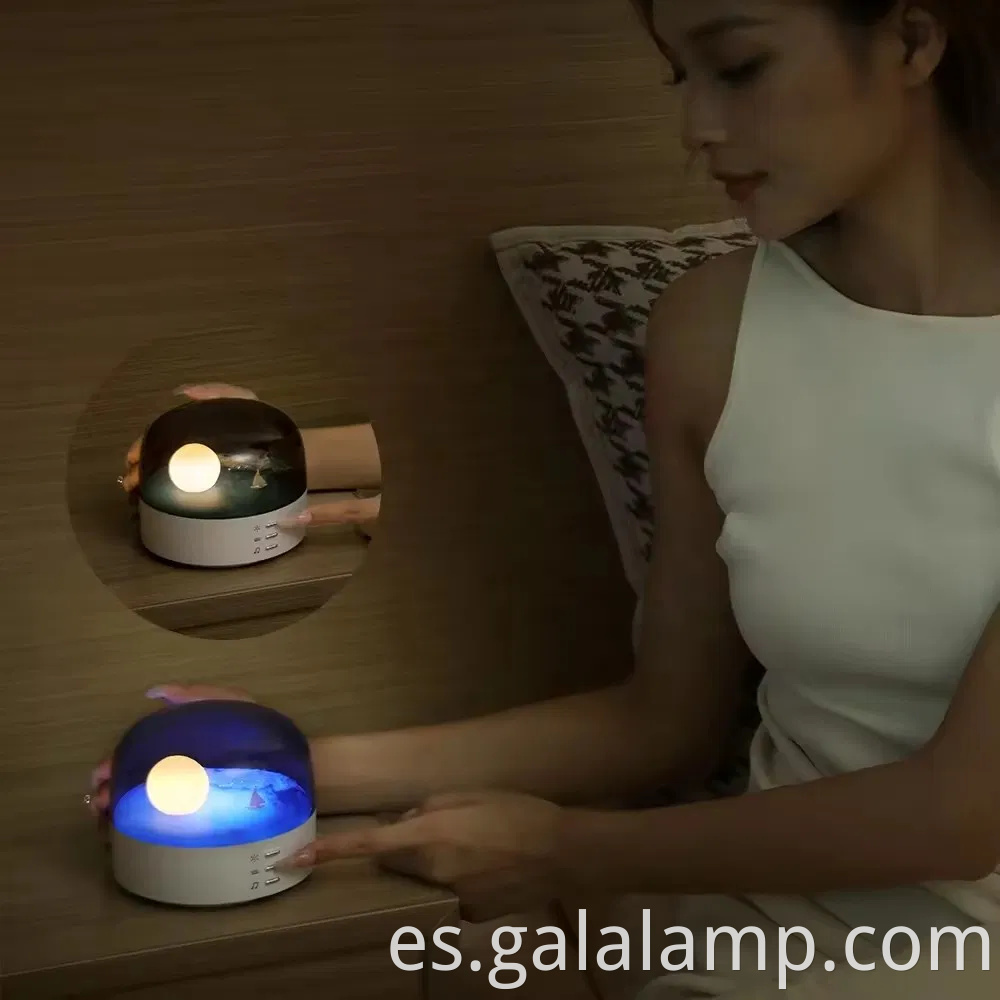 Elegante altavoz Bluetooth de luz de luna con relajante brillo de noche